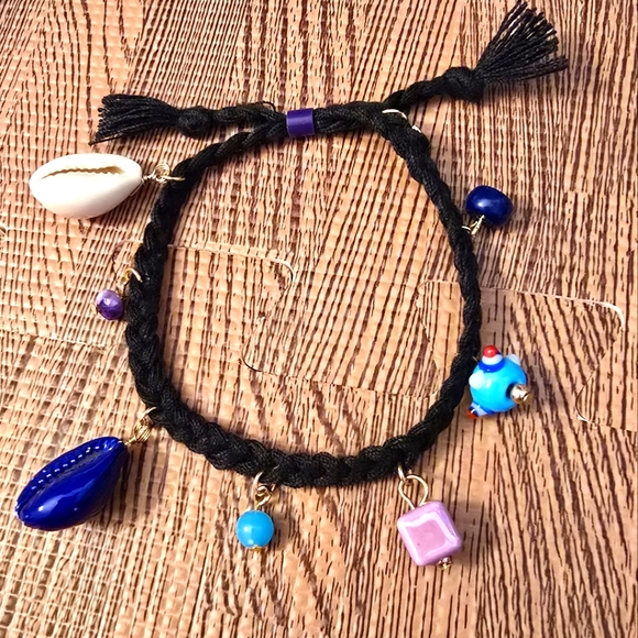 Free People Jewelry - Vintage Bracelet NWOT FREE PEOPLE Adjustable with 8 Charms, Thick Black Cord